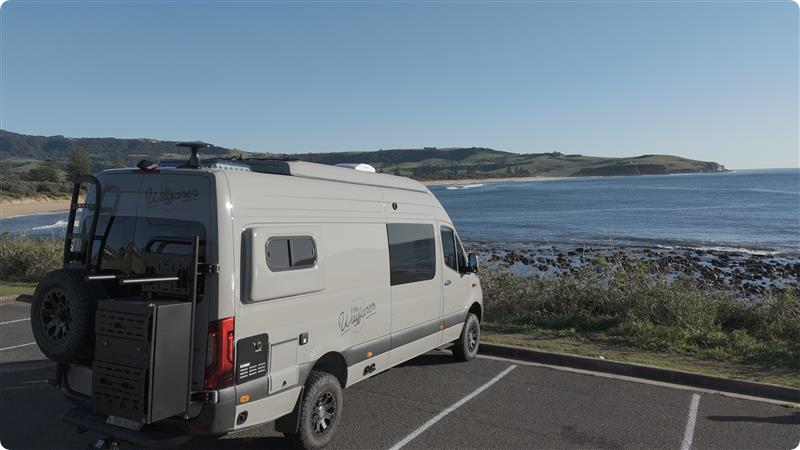 A van parked in a parking lot